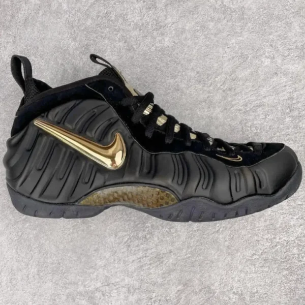 Nike Black Gold Foamposite Pro Sneakers