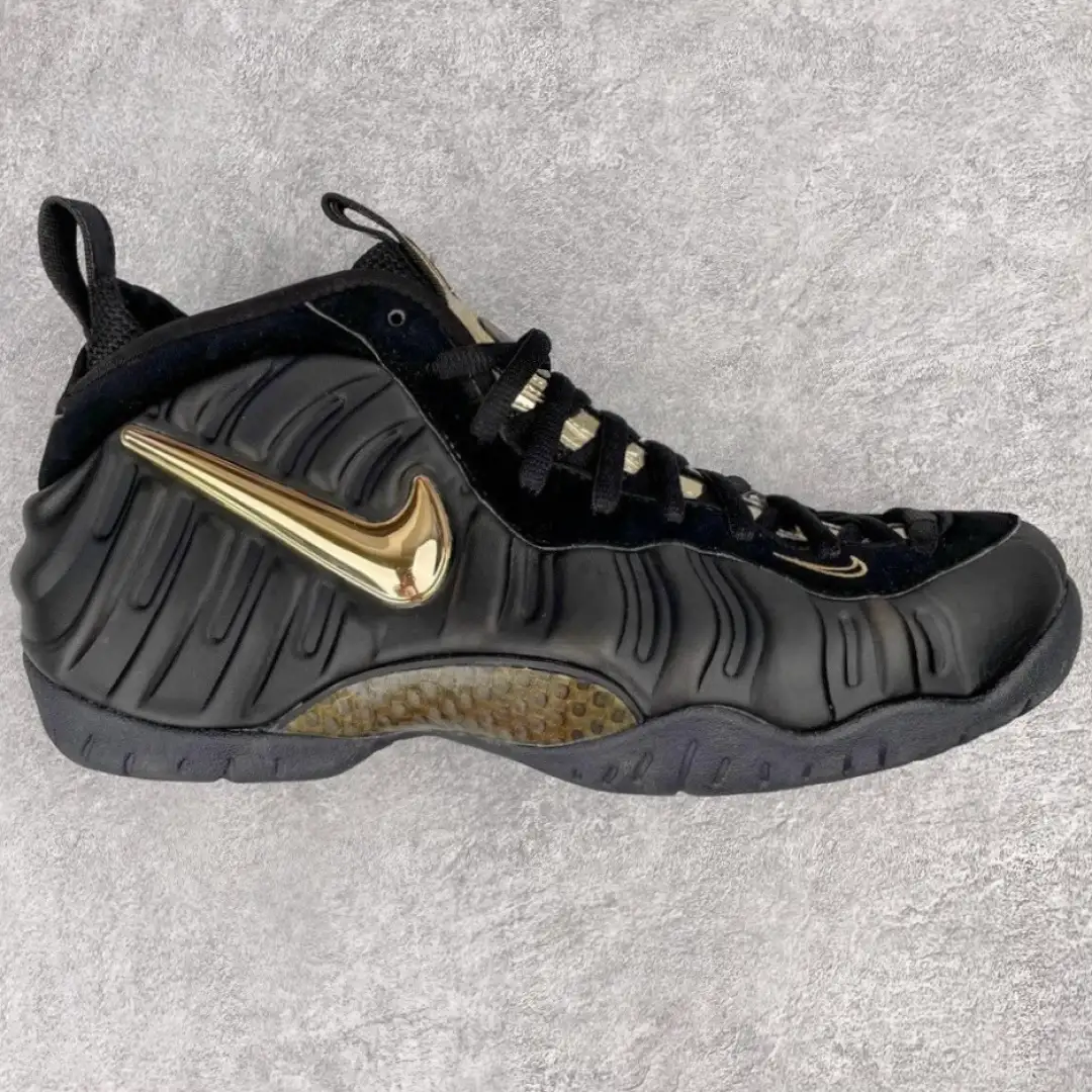 Nike Black Gold Foamposite Pro Sneakers - Image 1