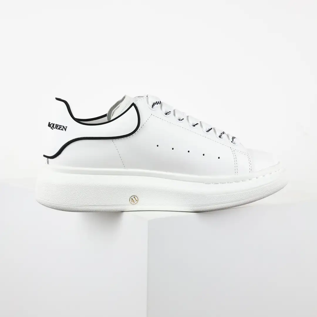 Alexander McQueen White/Black Trim Sneakers - Image 1
