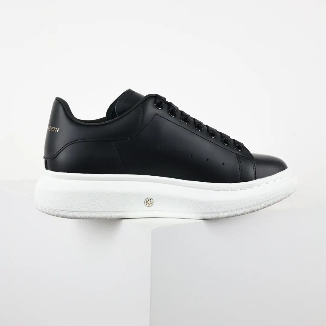 Alexander McQueen Black/White Sneakers - Image 1