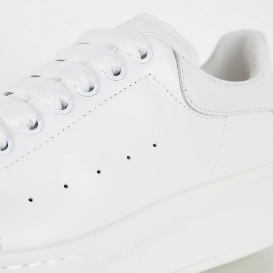 Alexander McQueen All-White Sneakers - Image 9
