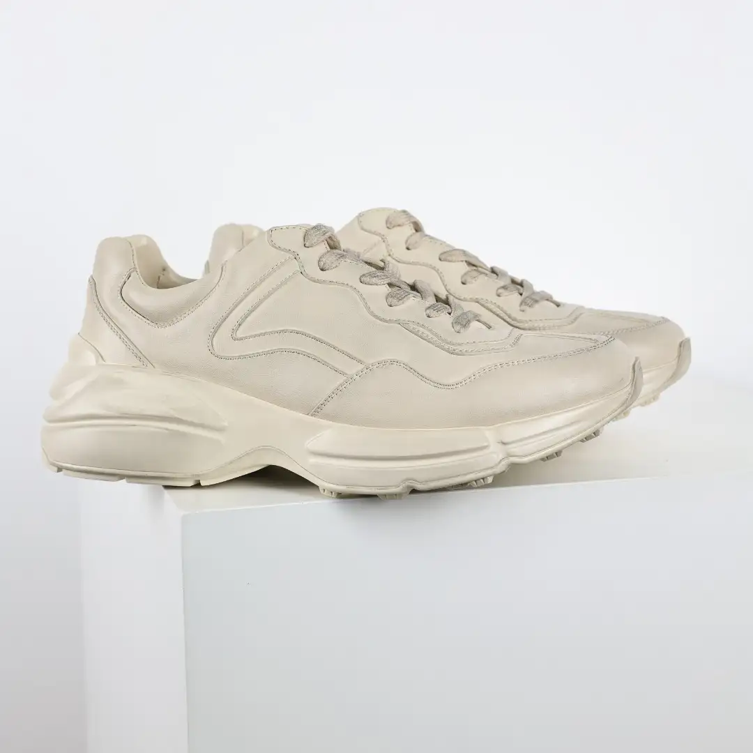 Gucci Rhyton Solid Color Distressed Chunky Sneakers - Image 1